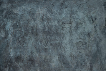 Dark grey textured background with crackling effect. High resolution image with copy space
