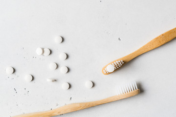 Zero waste, sustainability and minimalism concept. Wooden ecological bathroom accessories on white background