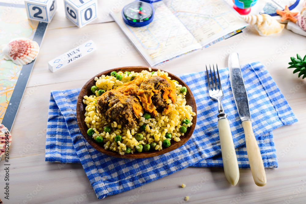 Wall mural bulgur with homemade roasted beef meatballs.