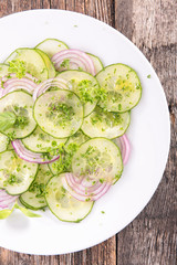 cucumber salad with onion and parsley