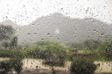 raindrops on window in rainy day