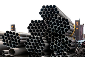 Metal rolling. A round tube are stacked in storage for sale and loading in stock. View from the front, end view, close-up.