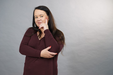 Thinking adult woman