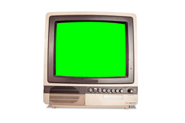 front view of old retro home TV receiver with blank green screen isolated on white background with clipping path