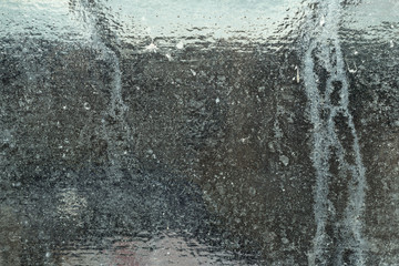 Texture of glass, crack, dust and scratches, close-up