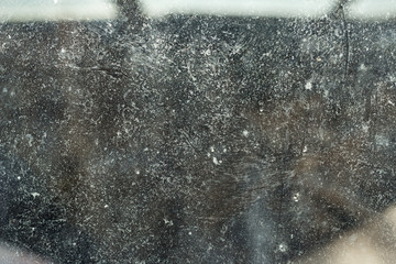 Texture of glass, crack, dust and scratches, close-up