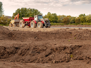Building new road, Heavy machinery on construction site. Tractor, dumper, excavator, Concept work...
