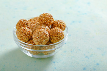Pile of handmade Tilgul Laddu , sesame seeds for Makar Sankranti festival,