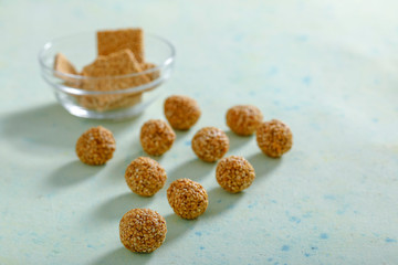 Pile of handmade Tilgul Laddu , sesame seeds for Makar Sankranti festival,