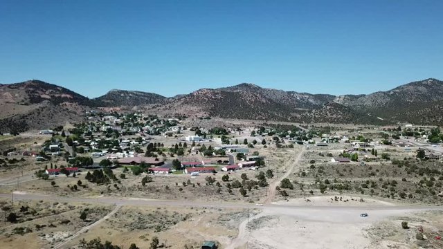 Desert Town and Old Abandon Silver Ore Mine Aerial View with Drone in Summer Nevada