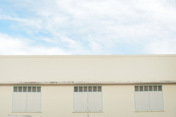 Landscape of apartment buildings on a clouds with blue sky 