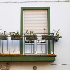 window on the white building facade in Bilbao city Spain