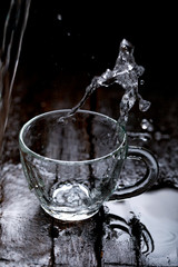 water splash in glass cup