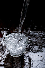 water splash in glass cup