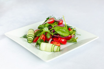 Spring salad with radishes, cucumbers and tomato-2.