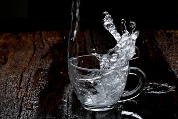 water splash in glass cup