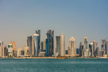 Naklejka na ściany i meble Urban landscape of modern Doha city skyline with skyscrapers