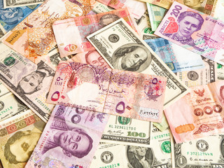 Background from paper money of the different countries. Global currency