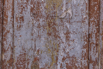 Cracked weathered blue painted wooden board texture.