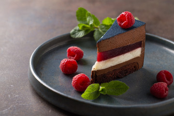 Chocolate dessert with raspberry and mint