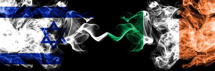 Israel vs Ireland, Irish smoky mystic flags placed side by side. Thick colored silky smokes flag of Israel and Ireland, Irish