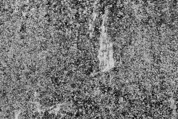 The concrete texture, wall, with cracks and scratches can be used as a background