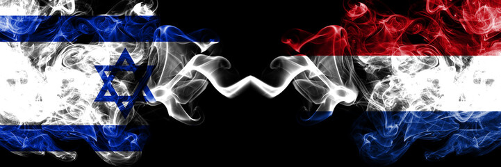 Israel vs Netherlands, Dutch smoky mystic flags placed side by side. Thick colored silky smokes flag of Israel and Netherlands, Dutch