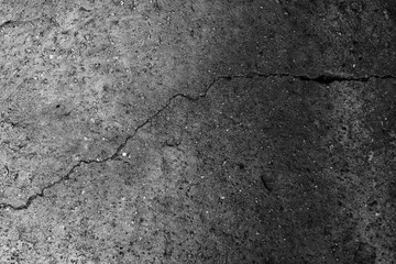 Obraz premium The concrete texture, wall, with cracks and scratches can be used as a background