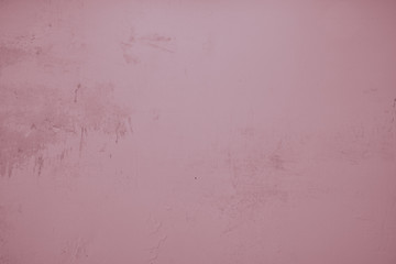 Pastell Rosa Hintergrund mit rauen strukturen und verputzen Stellen. Pinke Textur, Wand, gefärbte Wand.
