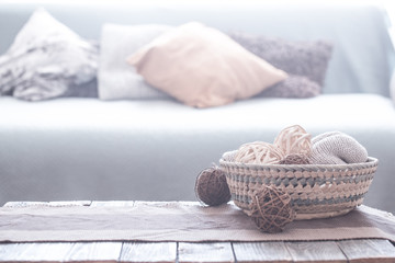 Fototapeta premium Home cozy minimalist interior decor on the background of the sofa with cushions