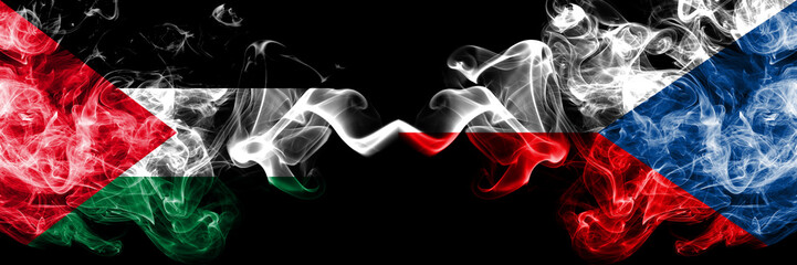 Palestine vs Czech Republic smoky mystic flags placed side by side. Thick colored silky smokes flag of Palestinians and Czech Republic
