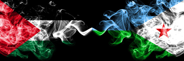 Palestine vs Djibouti smoky mystic flags placed side by side. Thick colored silky smokes flag of Palestinians and Djibouti