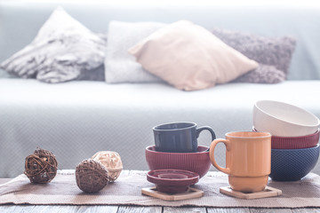 still life interior decor with home utensils on a wooden table