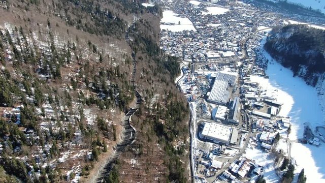Mountain town with stunning view on the mountains, aerial footage in 4k