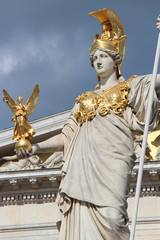 Obraz premium statue of athena with a victory in front of the parliament in Vienna (Austria)