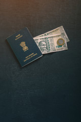 Indian passport with indian currency 