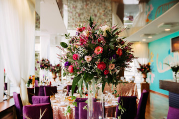 Bouquet of flowers. Romantic table setting in a restaurant. 