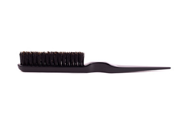Boar wool comb brush isolate. Black hairbrush on white background