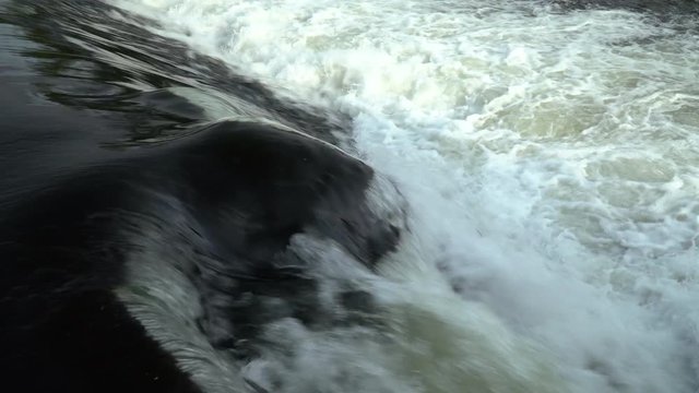 River waterfall forming a natural arc. Natural scene