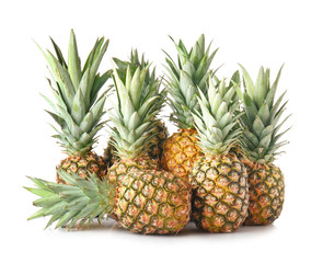 Fototapeta premium Ripe pineapples on white background