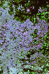 metallic sparkling sequins scales background, round sequins in fashion dress,