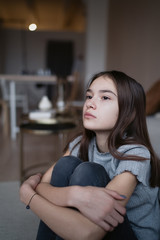 Sad teenager feeling bad alone, feeling depressed, regrets of mistake, having problems, adolescent girl with broken heart                