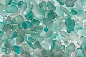 glass pebbles, blue background