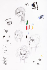 sketches of girl's heads and eyes