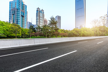 Shanghai modern commercial office buildings and empty asphalt highway