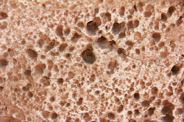 brown stone or mwith cracks and patternsarble wall a texture