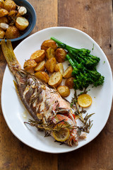 Roast red snapper with rosemary potatoes