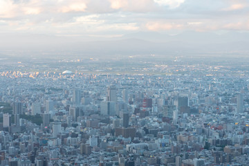 Naklejka na ściany i meble Sapporo city skyline view from Mount Moiwa. Sapporo, Hokkaido, Japan
