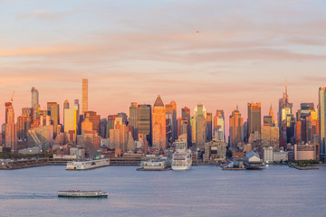 New York City midtown Manhattan sunset skyline panorama view over Hudson River