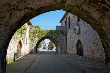 Fototapeta na wymiar Medieval archs in small town in Spain